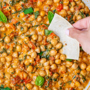 Marry Me Chickpeas with bread dipped in